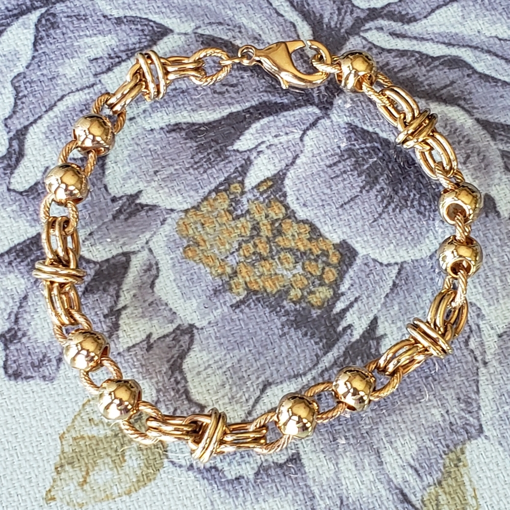 Gold plated heavy-weight bracelet.